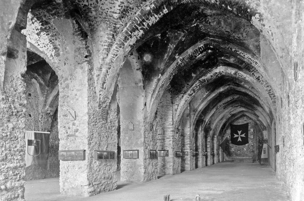 Black and white photography of the Arsenal di Amalfi. Stone arches.