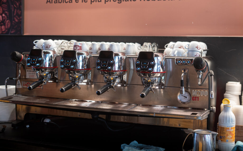 Espresso machine in a bar at Termini station, Rome Italy.