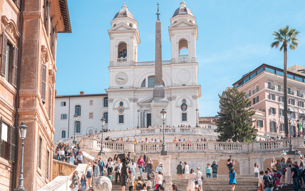 Sunny morning at the Spanish Steps. Ideal spring weather for sightseeing. The steps are getting filled with tourist in the early morning.